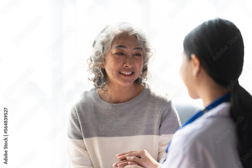 Young female doctor provide care medical service help support smiling old grandma at homecare medical visit. Young female doctor provide care medical service help support smiling old grandma at homecare medical visit.