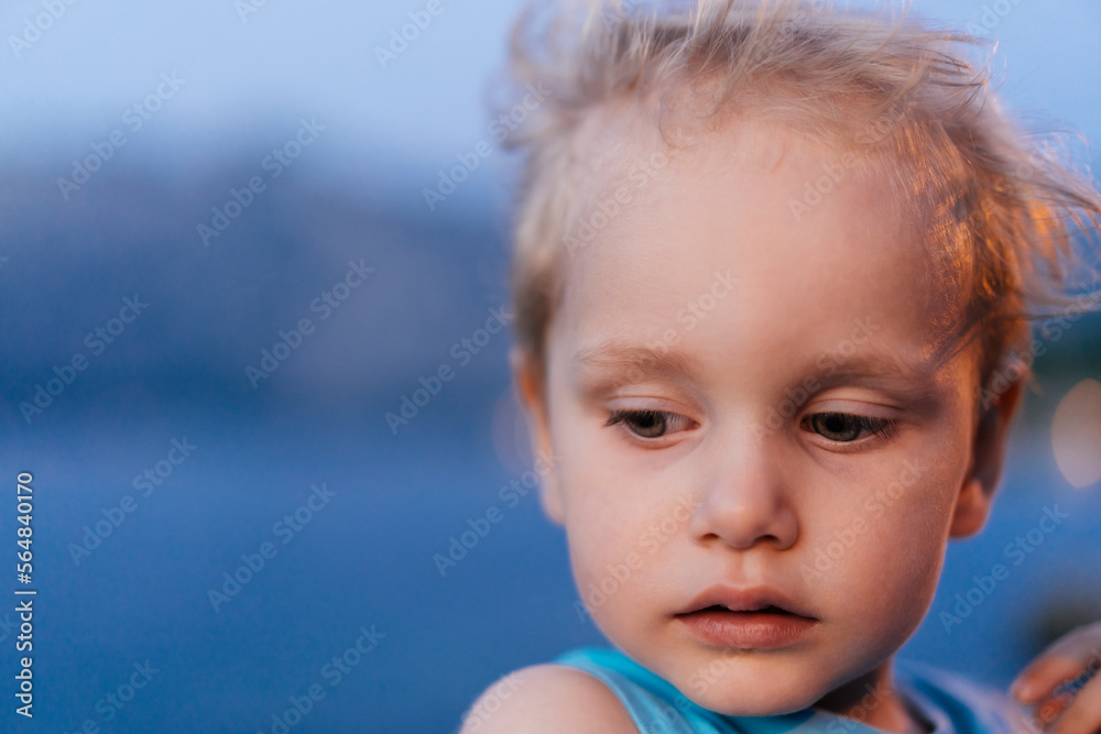 Portrait of a toddler boy looking away Portrait of a toddler boy looking away