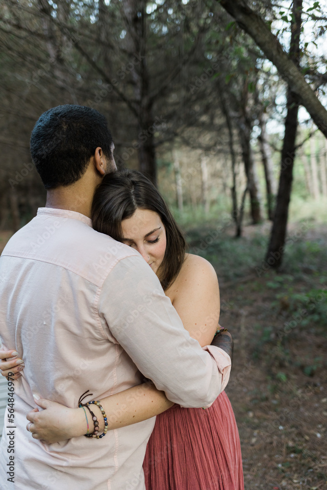 Couple Hugging In The Pine Forest Couple Hugging In The Pine Forest