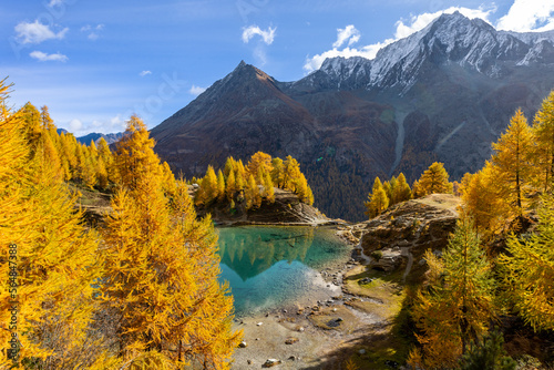 Blue alpine lake in autumn
