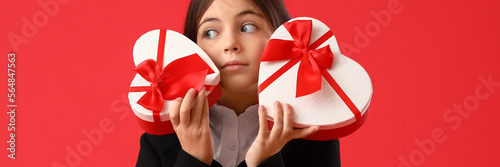 Funny little girl with gift...