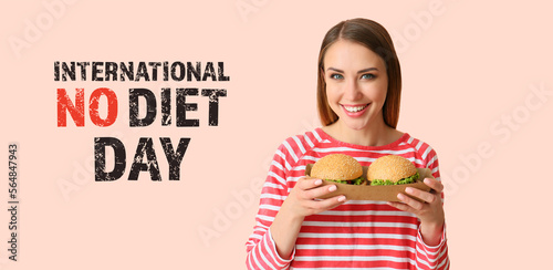 Young woman with tasty burg...