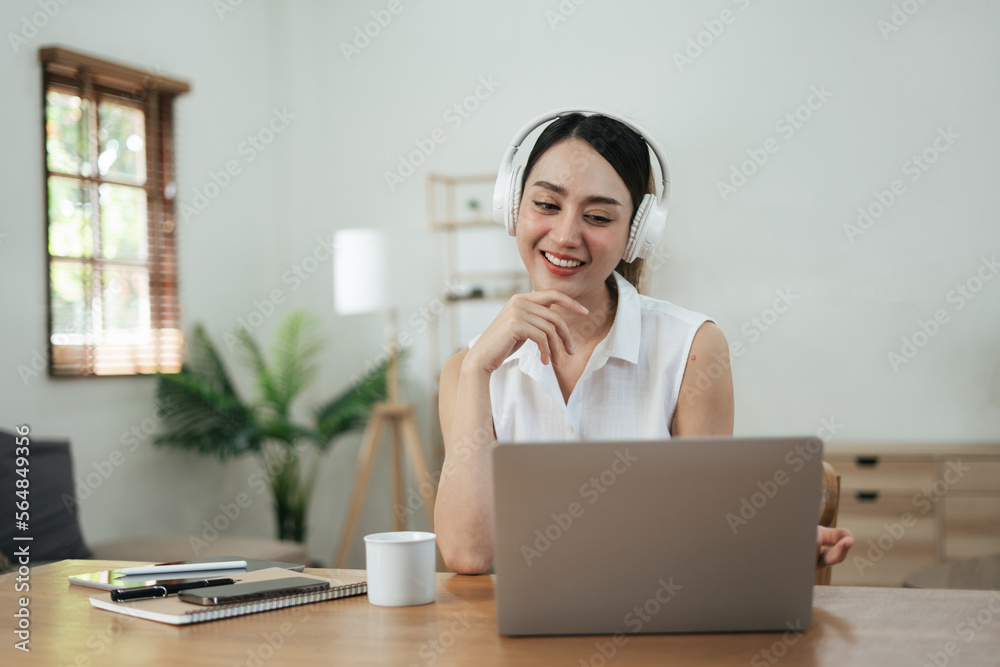 Beautiful Asian woman talikng with her friend by using video call. Beautiful Asian woman talikng with her friend by using video call.