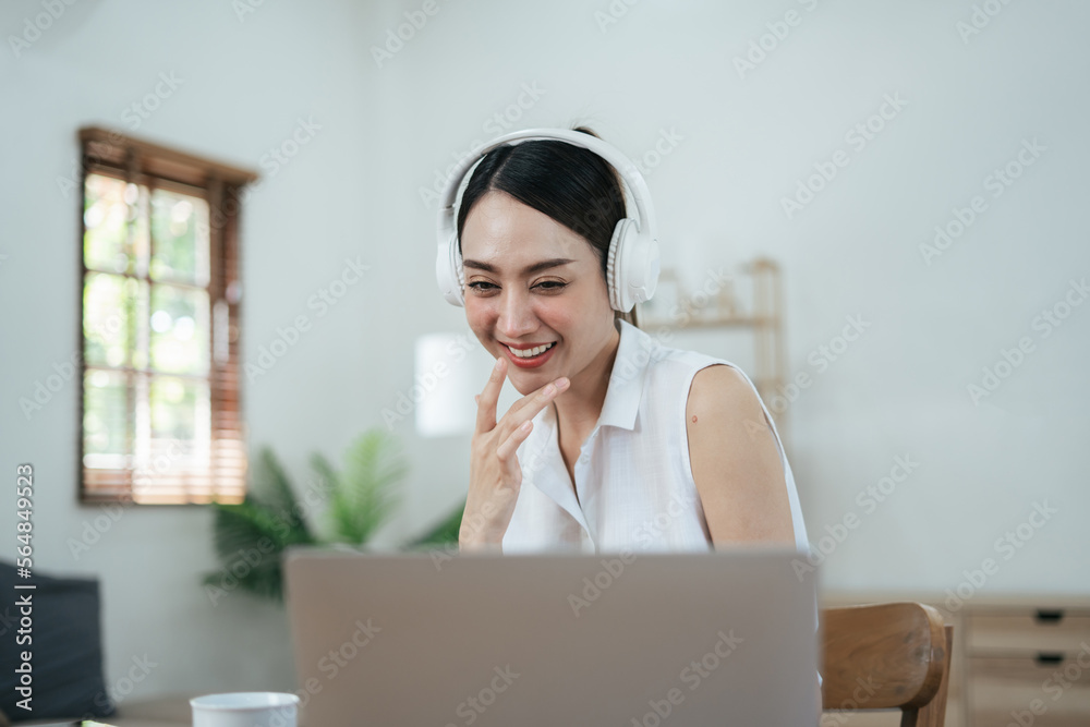 Beautiful Asian woman talikng with her friend by using video call. Beautiful Asian woman talikng with her friend by using video call.