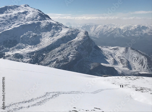 Mountaineers going down on Mount Eznevit at Aladaglar Mountain Range in Nigde, Turkey. Aladaglar is most important mountain range in Turkey. photo