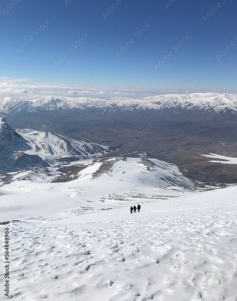 Mountaineers going down on Mount Eznevit at Aladaglar Mountain Range in Nigde, Turkey. Aladaglar is most important mountain range in Turkey.
