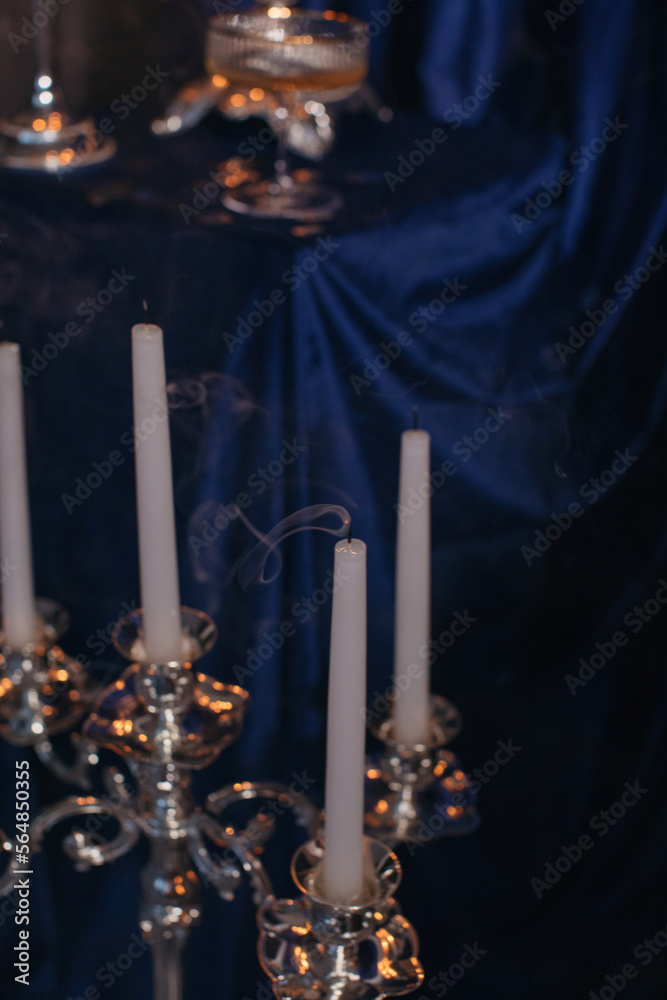 candles on blue velvet candles on blue velvet