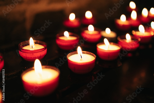 Candles with flame in the church photo