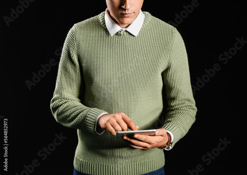 Young businessman using tab...