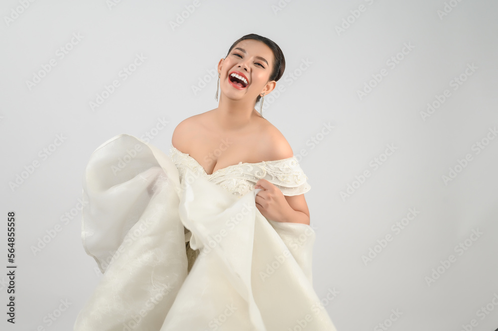 Young asian beautiful bride smiling with happy on white background Young asian beautiful bride smiling with happy on white background