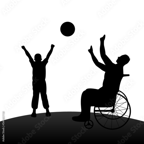 Disabled man in wheelchair playing ball with child . Happy family concept.