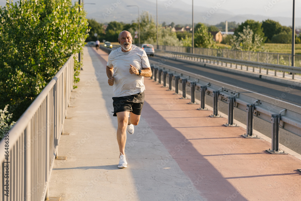 Senior Man Building Stamina For A Marathon Senior Man Building Stamina For A Marathon