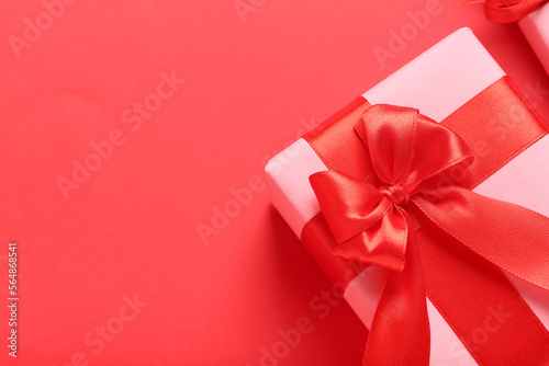 Beautiful gift for Valentine's Day celebration on red background
