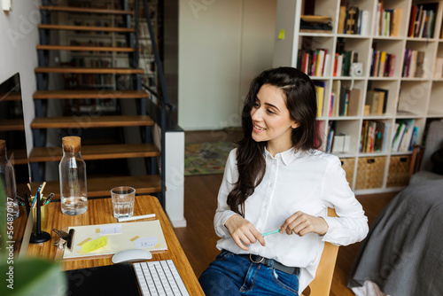 Woman At Work, On Teleconference photo