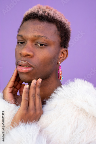 Transgender woman with white coat