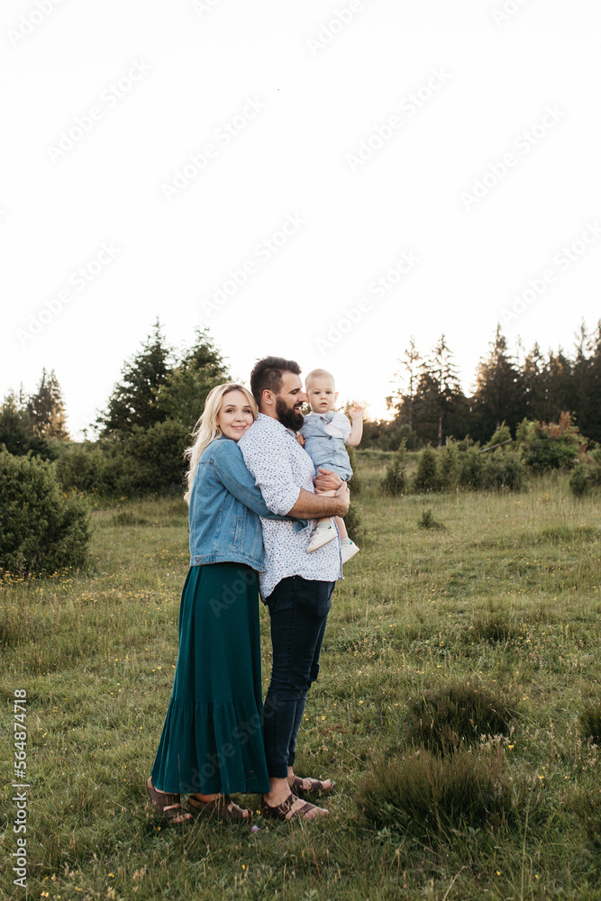 Family exploring nature while hugged Family exploring nature while hugged