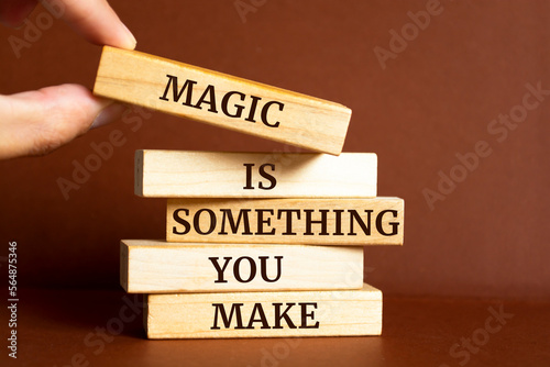 Wooden blocks with words 'Magic Is Something You Make'.