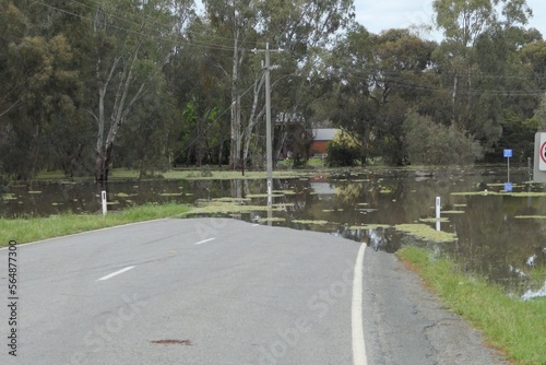 Road blocked by water from the flooded Goulburn River at Old Toolamba, Australia