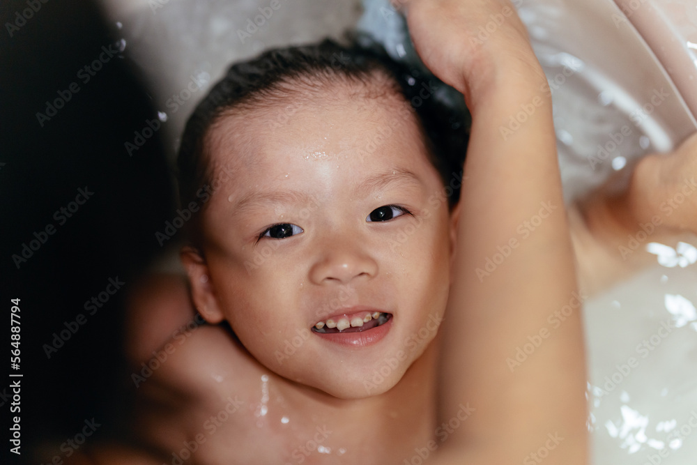 Adorable happy little kid in bath tub Adorable happy little kid in bath tub