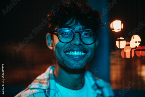 Cheerful man looking at camera photo