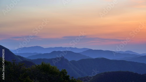 Fototapeta Naklejka Na Ścianę i Meble -  View of the surrounding mountains from the Hadong gliding field in South Korea