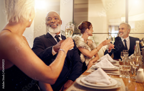 Canvas Print Man, toast and friends at restaurant party in night for diversity, business executive team and success
