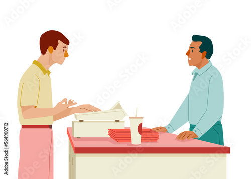 Male cashier serving client in store photo