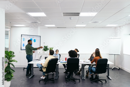  Businessman making a presentation at a meeting in the office