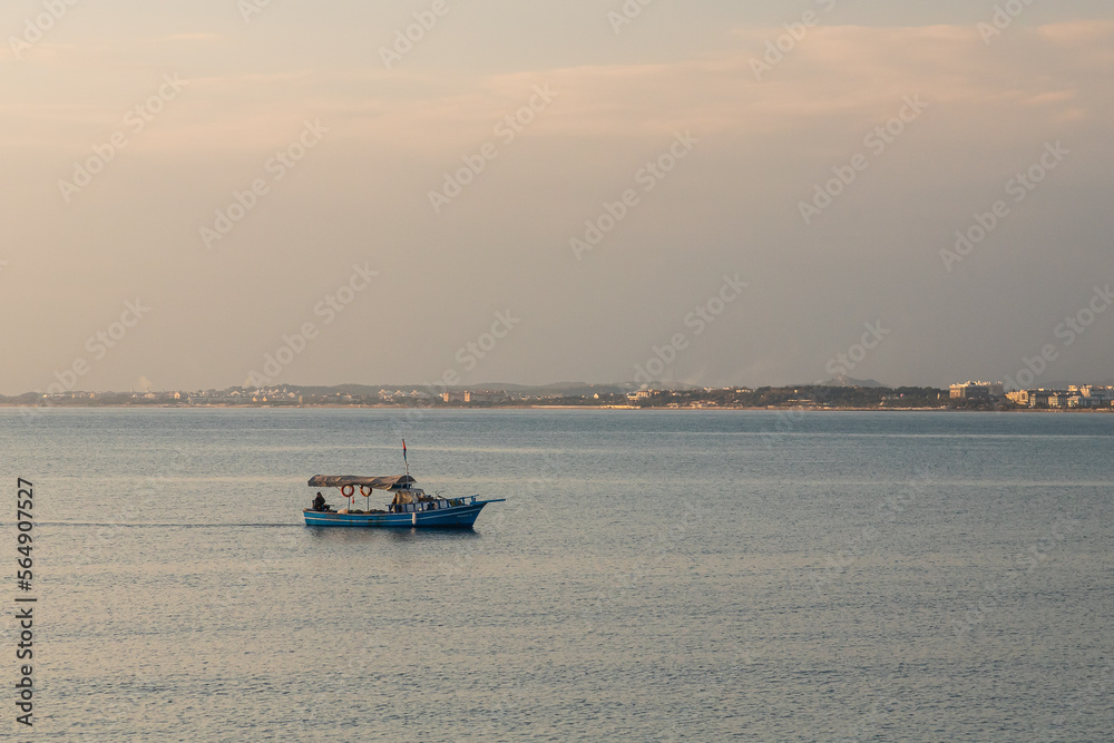 Side; Turkey – January 23 2023:    blue  yacht drifting in the blue sea