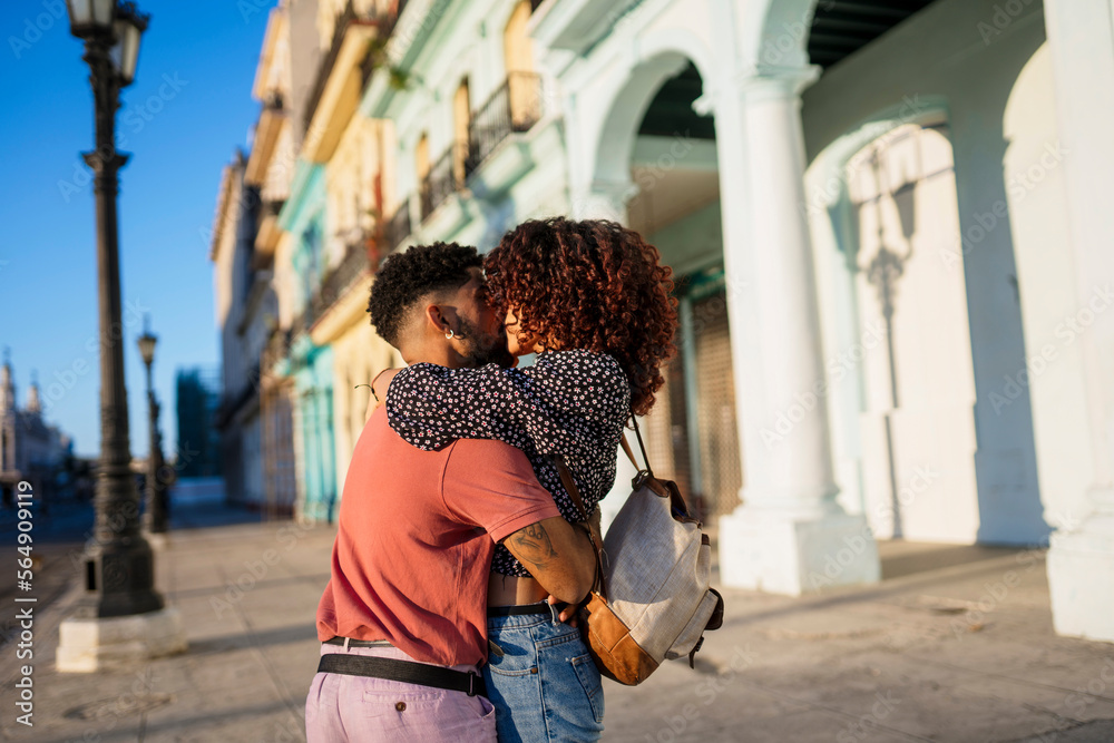 Cuban couple kissing on street Cuban couple kissing on street