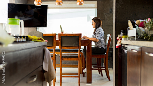 Female person carrying out her work activities remotely