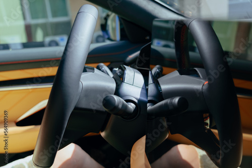 steering wheel of modern electric car photo