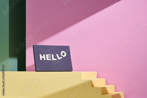  Hello blackboard sign on the color podium photo