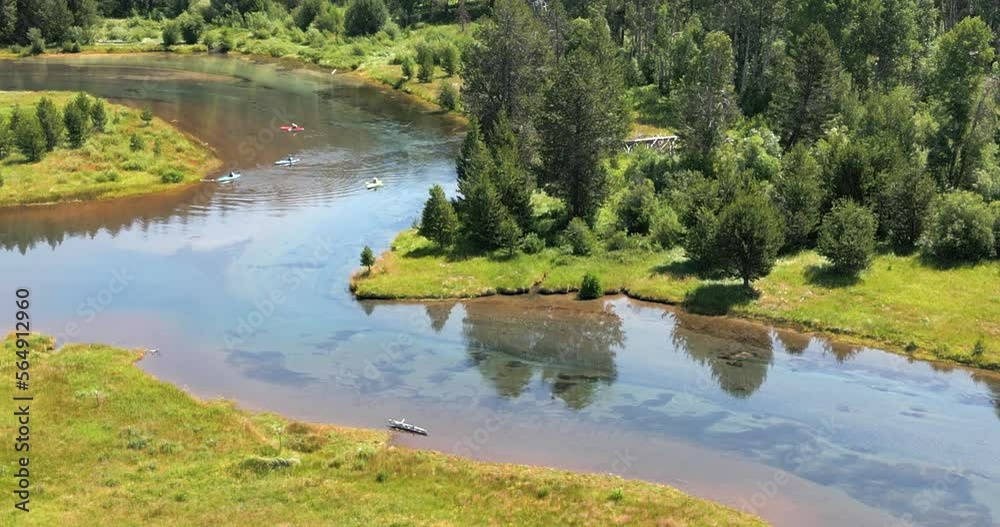 Beautiful Kayaking river in Southern Oregon with bright sunshine viewed form above Beautiful Kayaking river in Southern Oregon with bright sunshine viewed form above