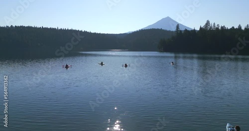 Friends Kayaking Willow lake in Southern Oregon with amazing landscapes photo