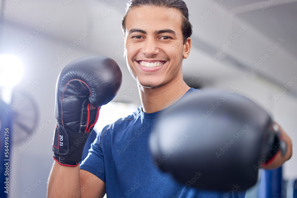 Fitness, portrait or happy boxer in training, cardio workout or exercise in a sports gym or health club. Face, man or healthy fighter in boxing gloves exercising with motivation, focus or goals