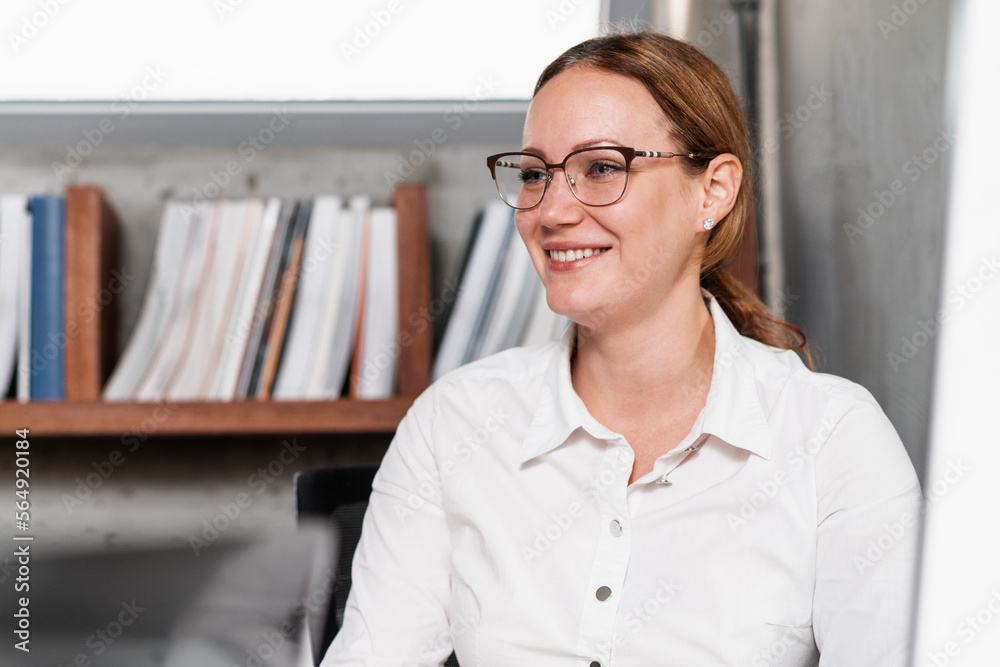 Portrait Of A Smiling Businesswoman In The Office Portrait Of A Smiling Businesswoman In The Office