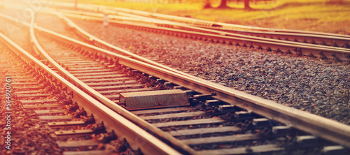 View of the crossing railway in sunset in summer.