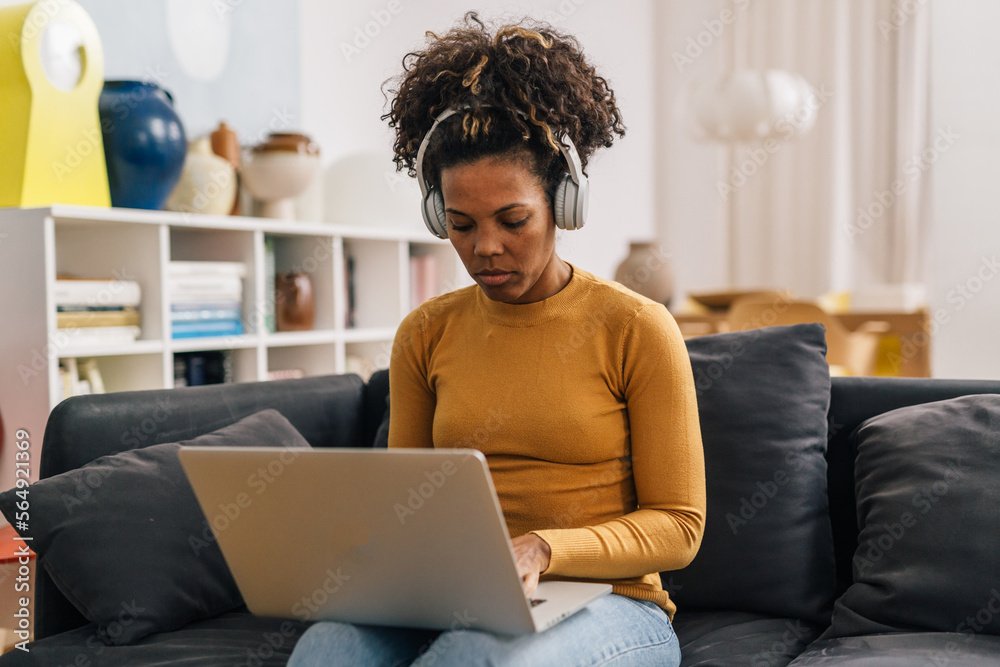 Mixed race woman works from home Mixed race woman works from home