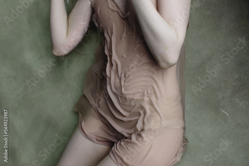 Woman lying in water