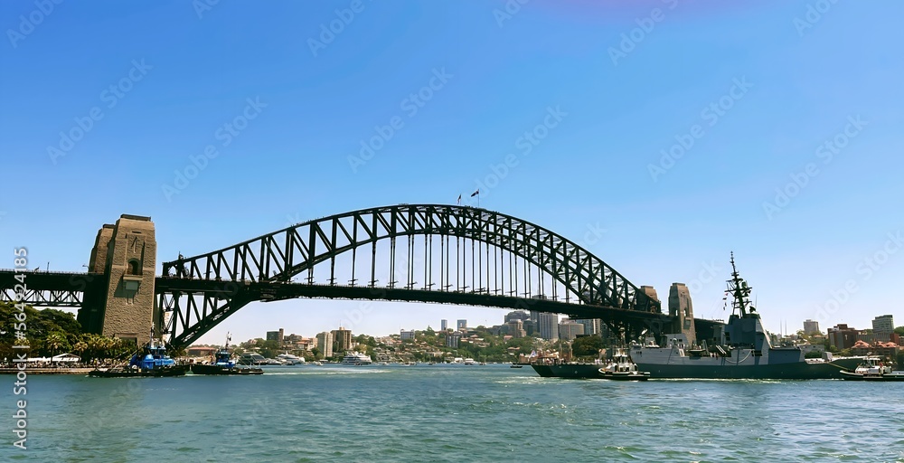Sydney harbour bridge with Sydney city landscape taken from a ferry boat looking over the water on Australia Day celebrations.