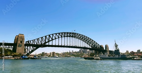 Sydney harbour bridge with Sydney city landscape taken from a ferry boat looking over the water on Australia Day celebrations. © Nicola