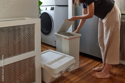 Woman recycling trash