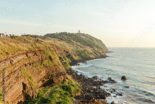 Coastal cliff landscape at sunset. photo