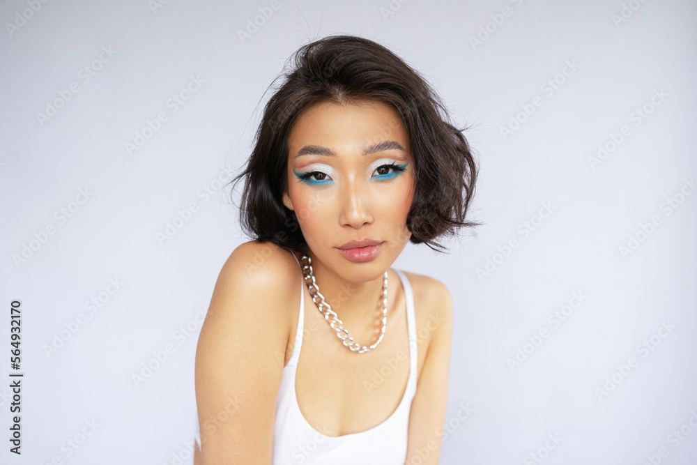 Female model with creative colorful makeup Female model with creative colorful makeup
