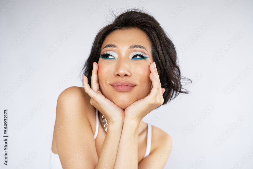 Woman Framing Her Face With Her Hands Woman Framing Her Face With Her Hands