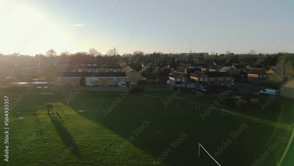 Epic shot of a British town during sunset with flares Epic shot of a British town during sunset with flares
