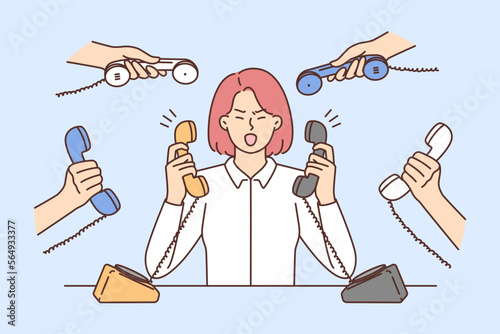 Furious businesswoman irritated with numerous calls