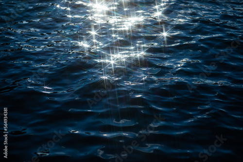 Sun reflection on water stars