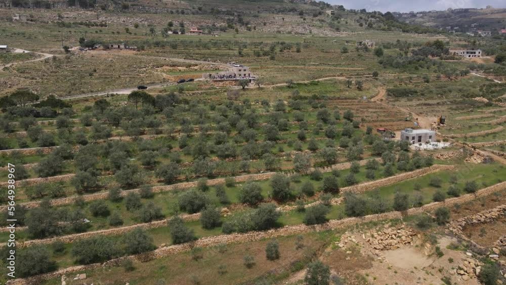 Qadisha Valley, Lebanon. Aerial View of Village and Agricultural Fields on Sunny Summer Day Qadisha Valley, Lebanon. Aerial View of Village and Agricultural Fields on Sunny Summer Day